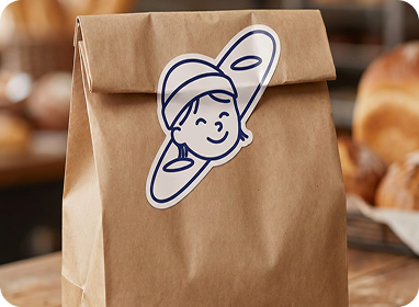 Brotschwester Signet auf einer Bäckereitüte